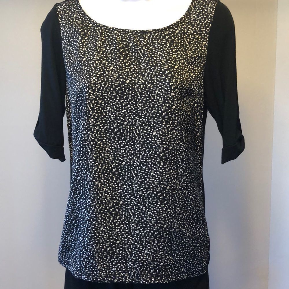The limited Harper polka dot top